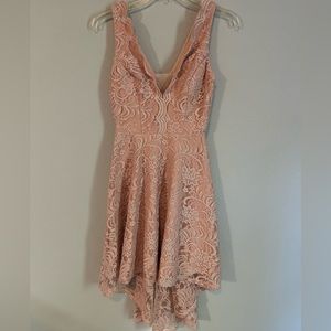 Woman’s light pink dress